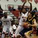 Milan sophomore Latin Davis defends Chelsea senior Jayden Sweeny on Friday. Milan won 71-40. Daniel Brenner I AnnArbor.com